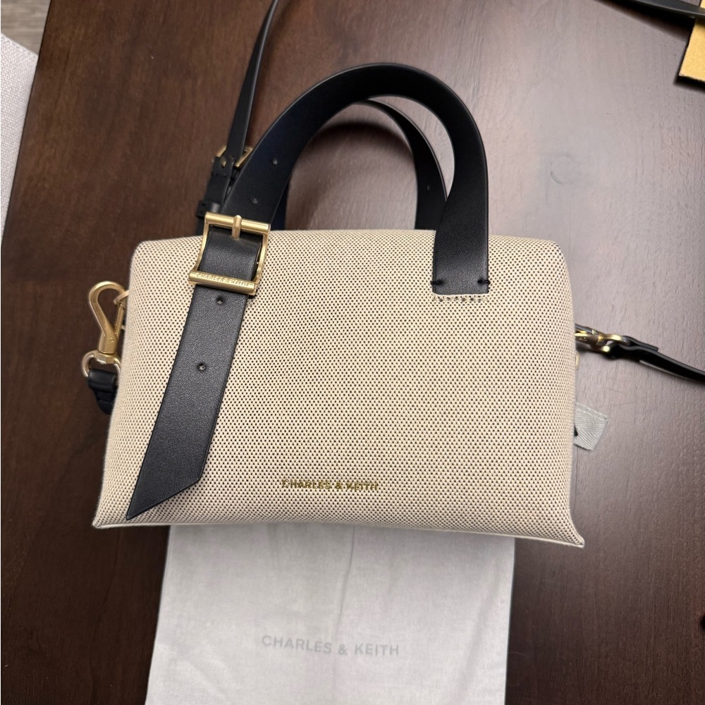 Charles & Keith Elegant Black and Cream canvas Satchel with shoulder strap - Picture 5 of 8